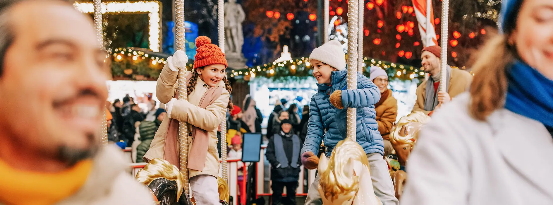 Christkindlmarkt am Rathausplatz, Ringelspiel, Kinder