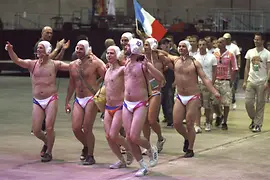 Men in swimming trunks at the opening of the EuroGames 2008 in Spain